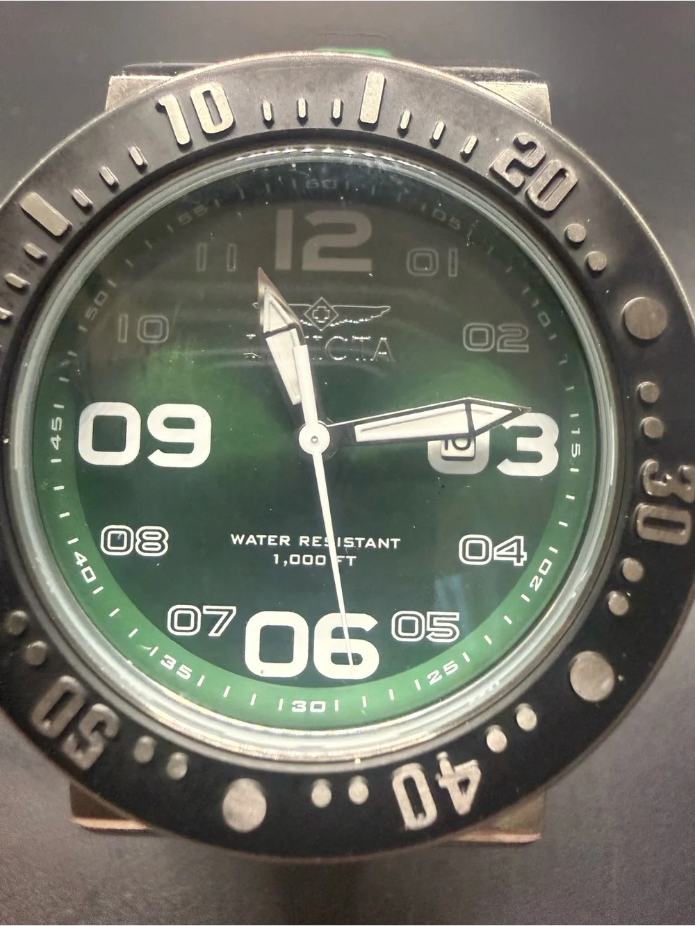 Invicta Pro Diver watch features a bold green dial And Band New Battery
